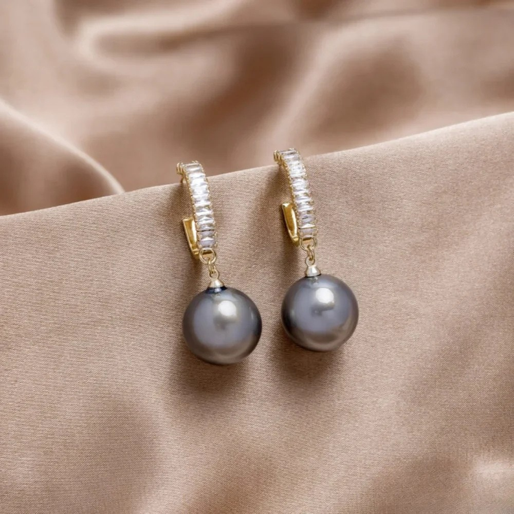 Boucles d'oreilles élégantes avec perles et zirconia