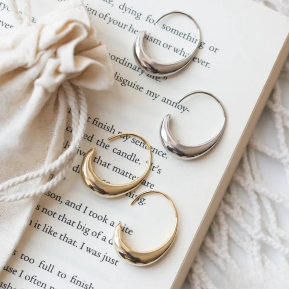 Boucles d'oreilles élégantes en or et argent