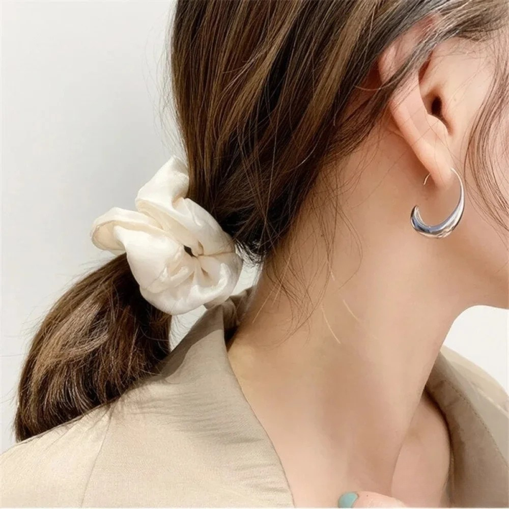 Boucles d'oreilles élégantes en or et argent